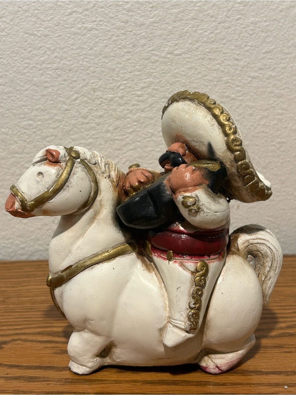 Vintage Mexican Folk Of A Mexican Musician Riding a Horse